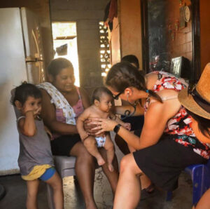 Jennifer Aist working at Nicaraguan village clinic.